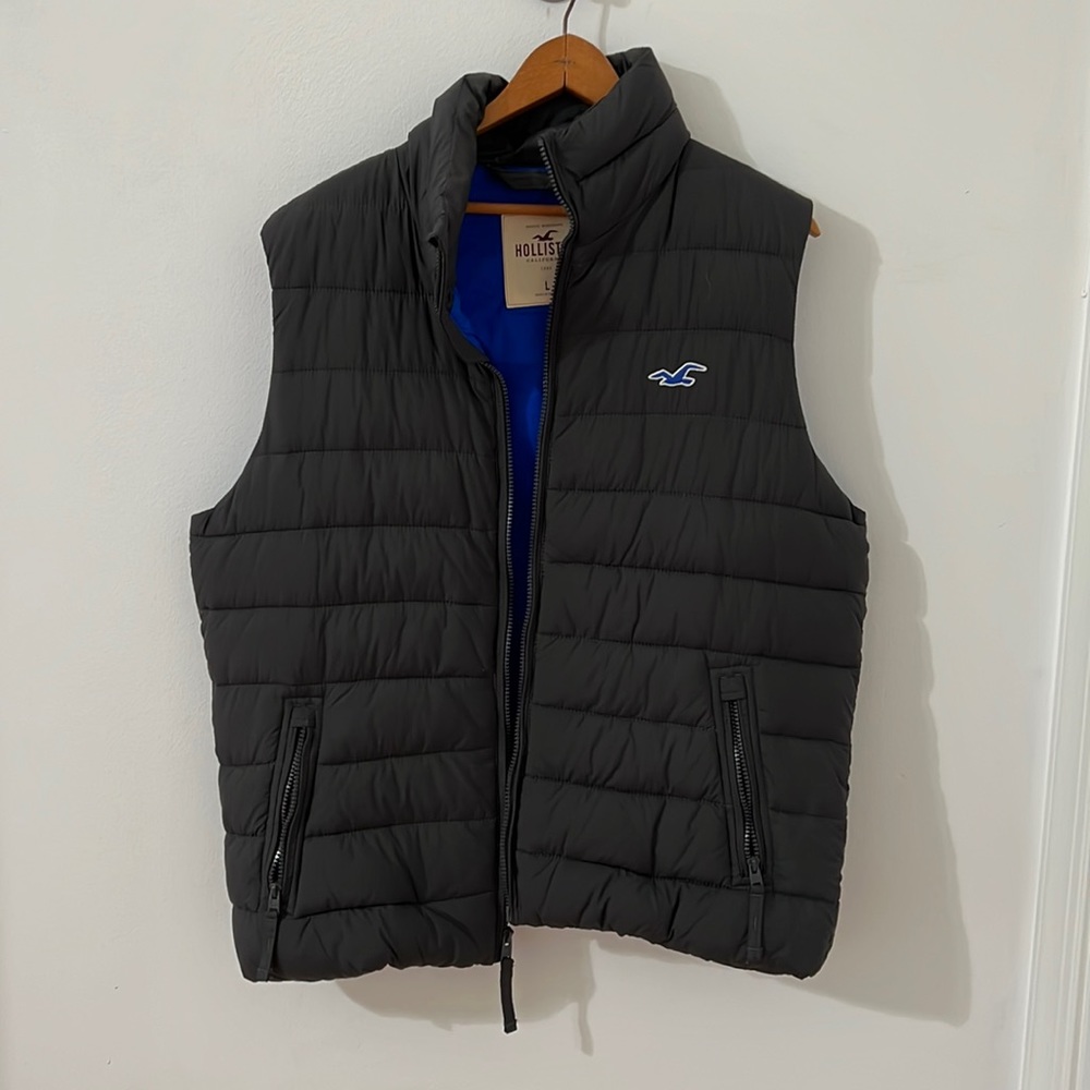 Hollister dark gray puffer vest with blue interior